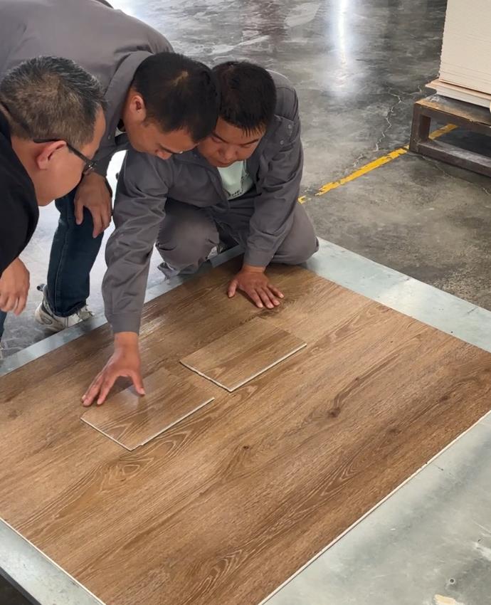 Inspection gate way for rigid core vinyl tiles 