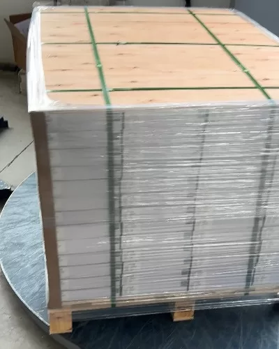 Packaged Rigid Core SPC products ready for shipping and export from China