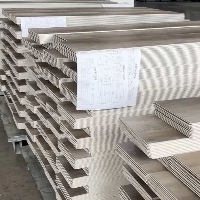 Produced SPC planks waiting for Pad attachments